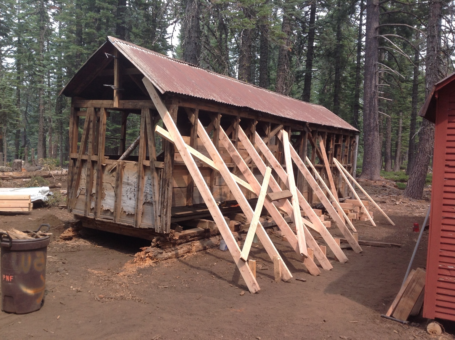 Swayne Logging Cabin supported with temporary bracing